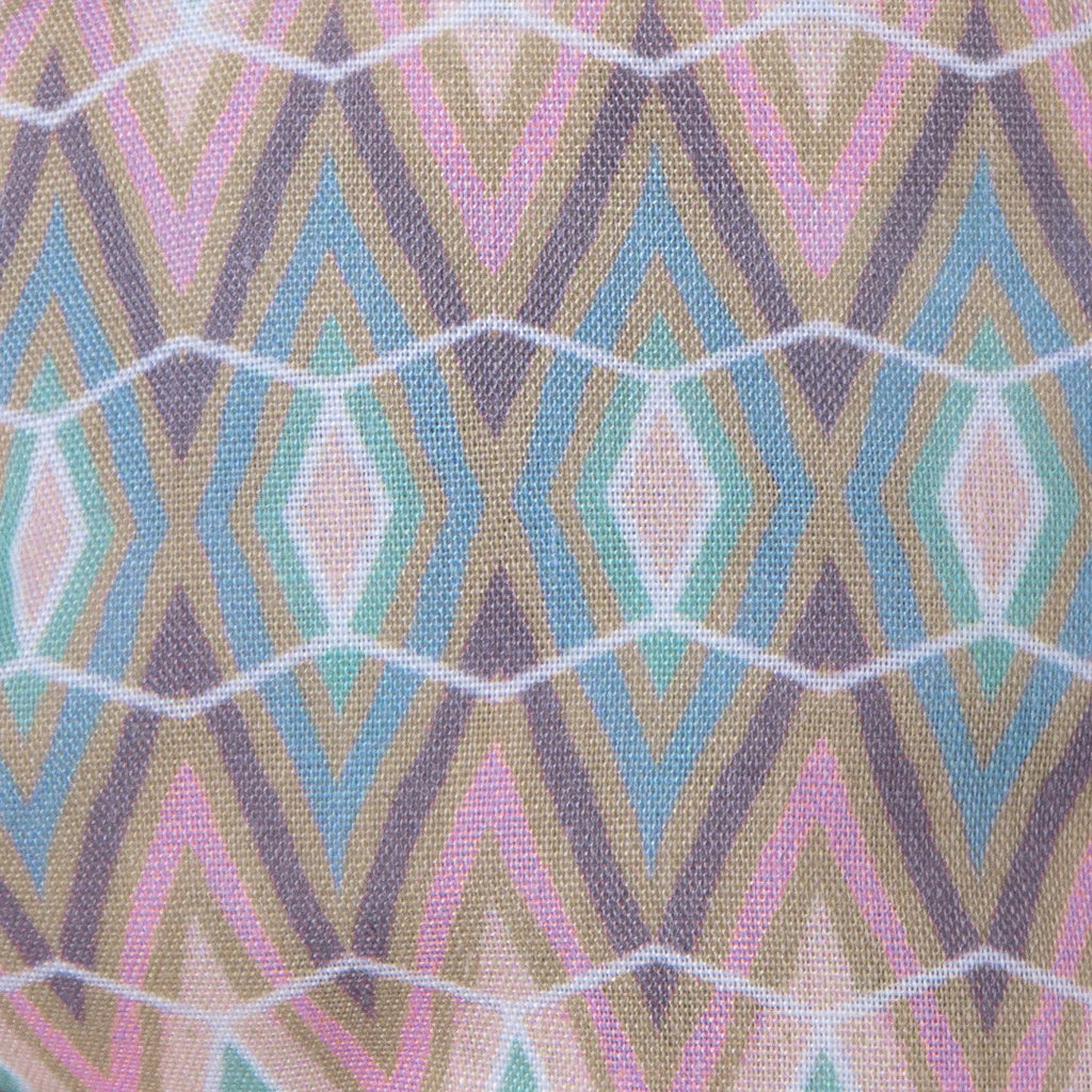 A close up image of the Kate Whyley wide, knotted headband cotton fabric, in subtle pastel hues, called Cool Stride